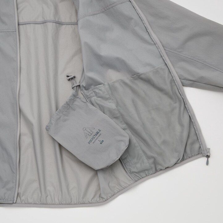 uniqlo uv-schutz-jacke für herren mit tasche orange