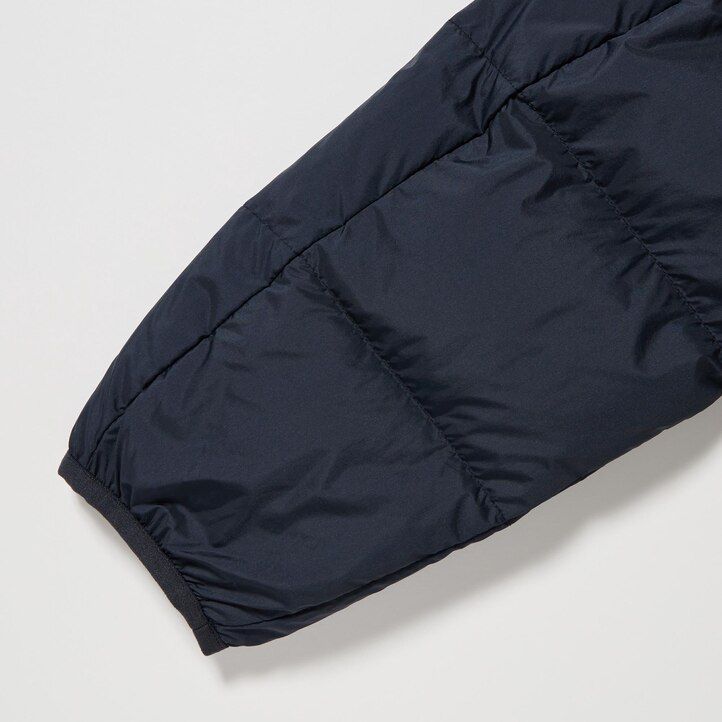 grüne uniqlo ultra light daunenjacke mit 3d-schnitt für herren