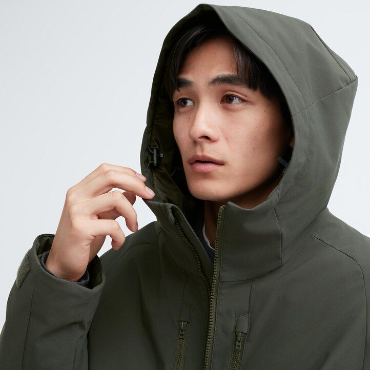 braune uniqlo hybrid-daunenjacken für herren mit 3d-schnitt