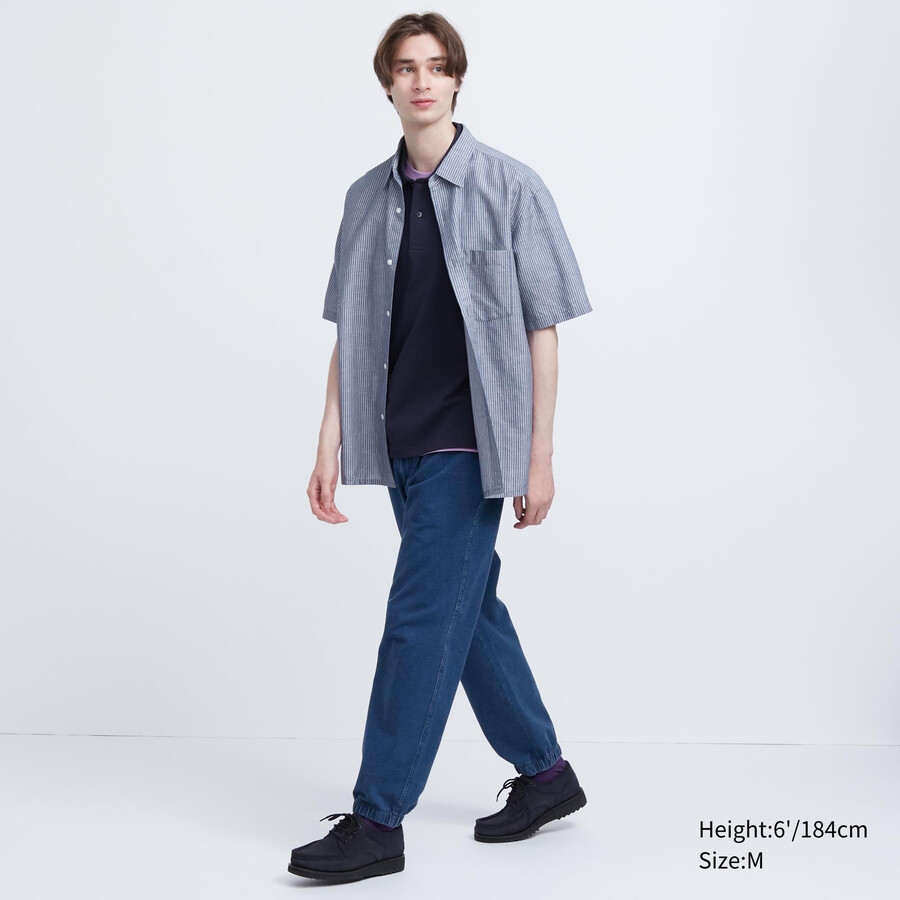 blaue herren-jogginghose von uniqlo im gewaschenen jersey-denim-look