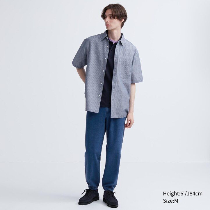 blaue herren-jogginghose von uniqlo im gewaschenen jersey-denim-look