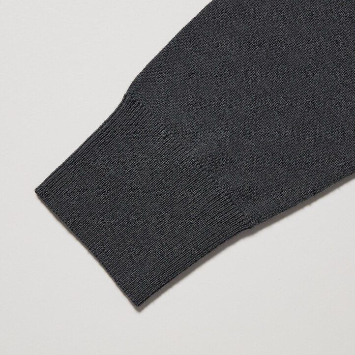 schwarzes uniqlo herren-poloshirt aus 100 extrafeinem merinostrick mit Ärmeln