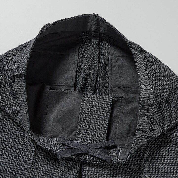 graue uniqlo herren-hose „smart gun club mit karomuster knöchellang