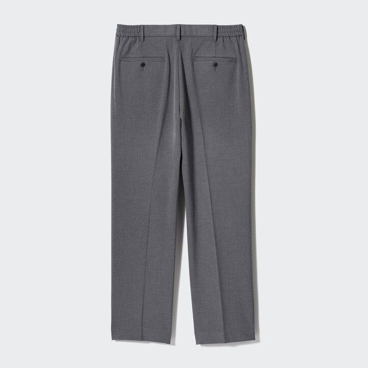 graue herren-hose von uniqlo mit bundfalten und weitem bein