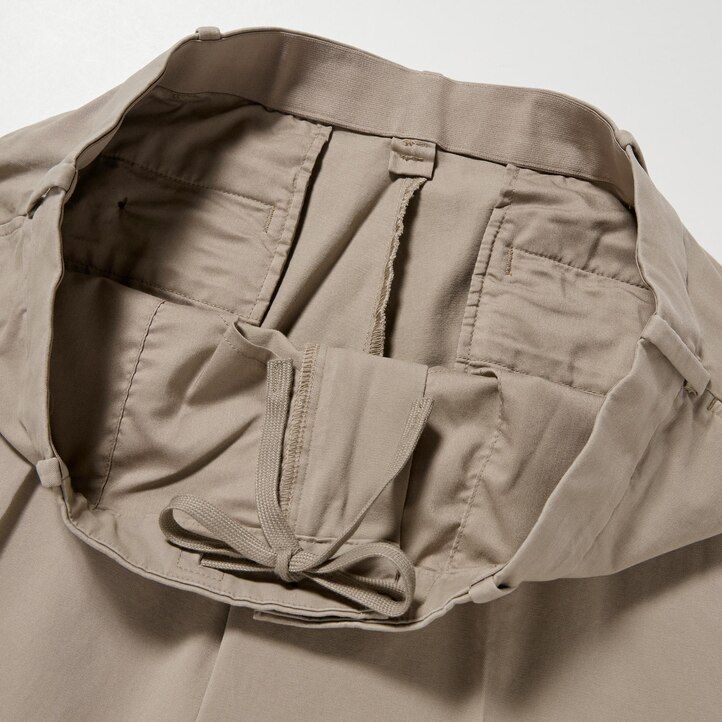 marineblaue uniqlo smart cotton herrenhose in knöchellänge