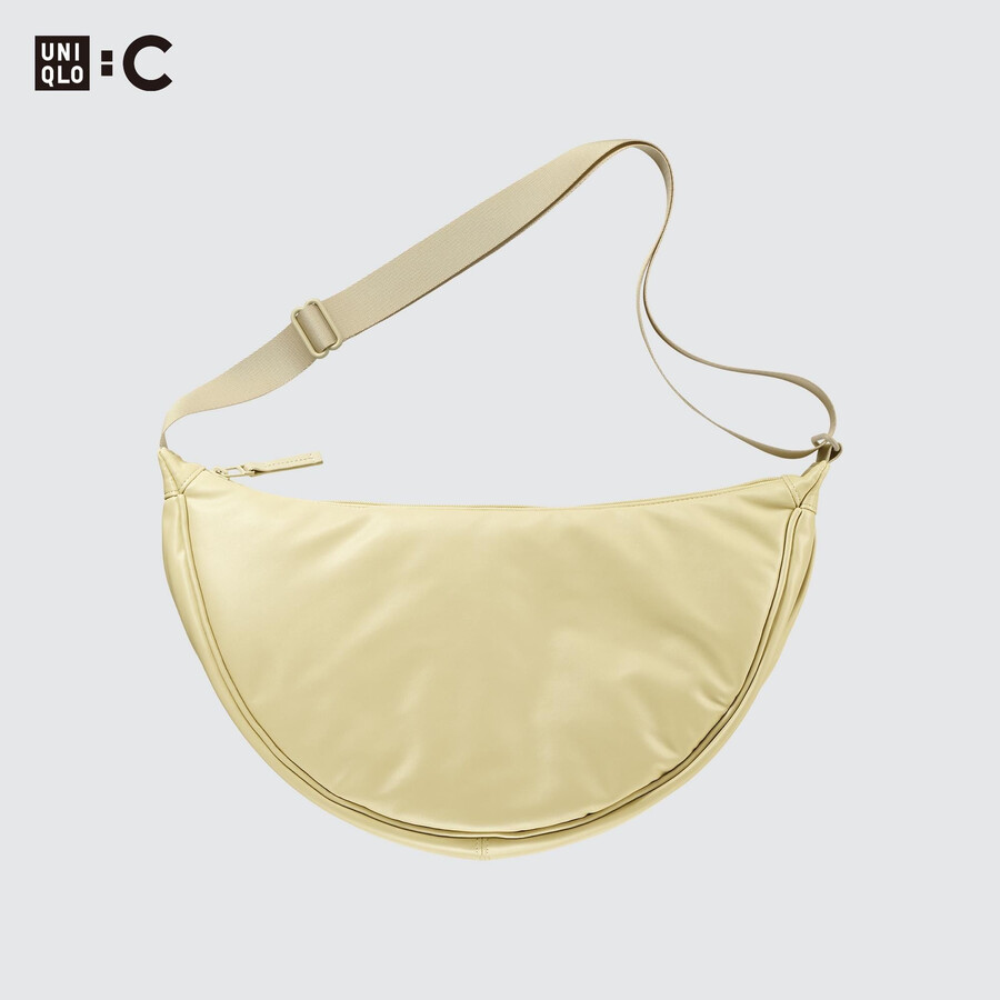 gelbe runde uniqlo-schultertasche für damen