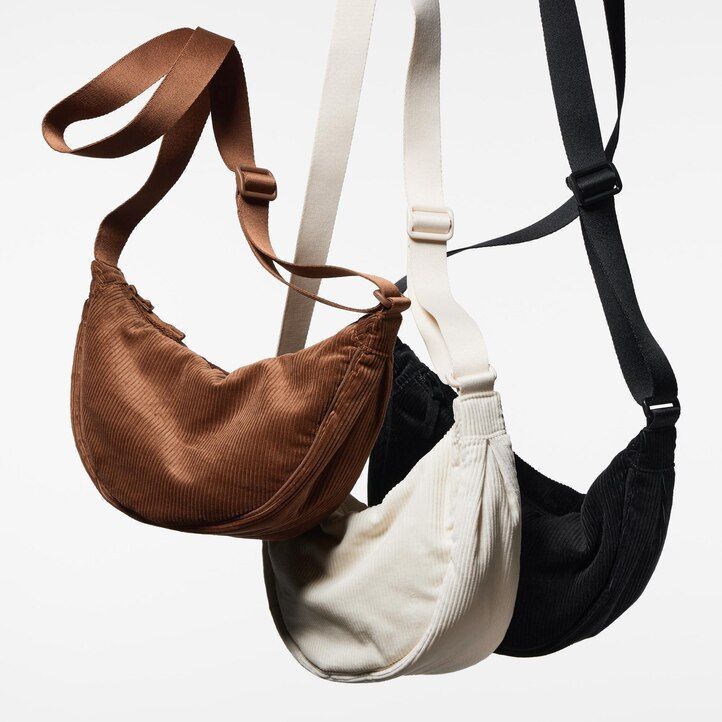 uniqlo mini-schultertasche in olivgrün rund aus cord damentaschen