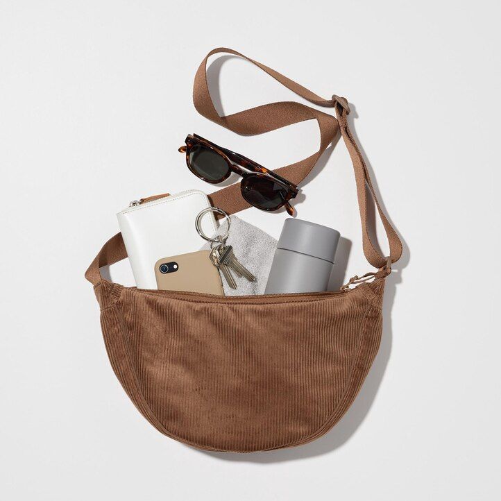 uniqlo mini-schultertasche in olivgrün rund aus cord damentaschen