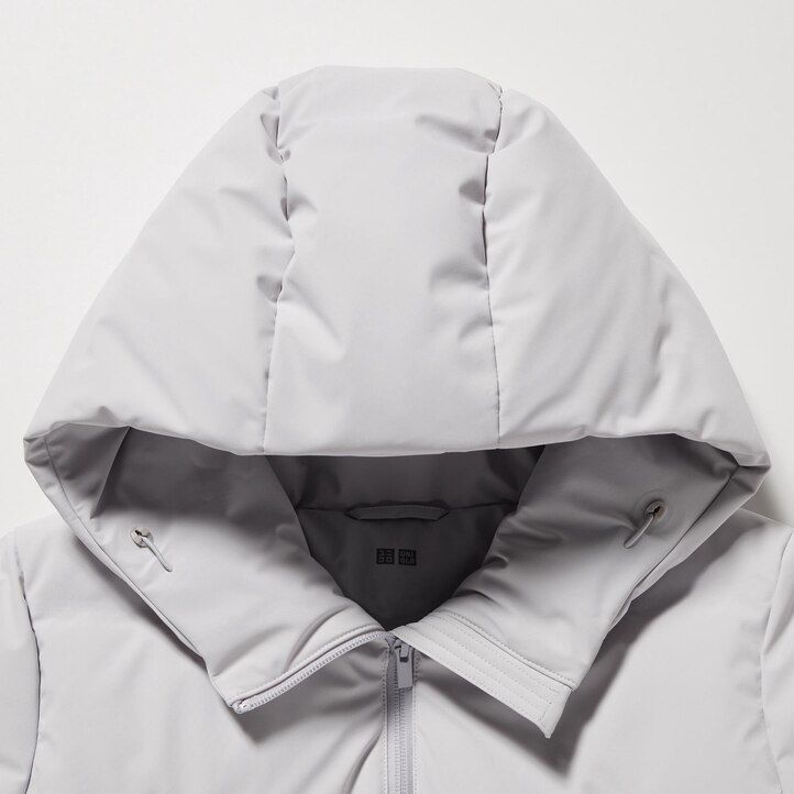 blaue nahtlose daunenjacken von uniqlo für damen
