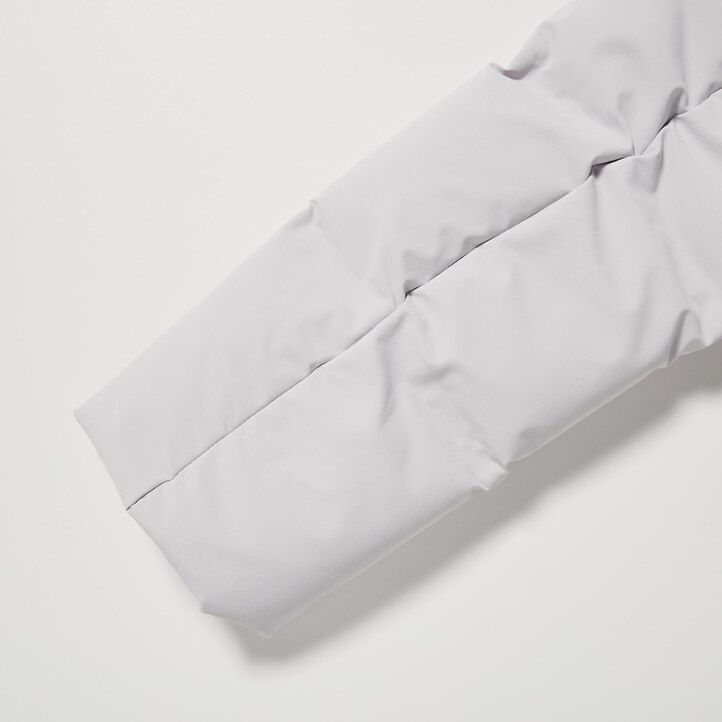 blaue nahtlose daunenjacken von uniqlo für damen
