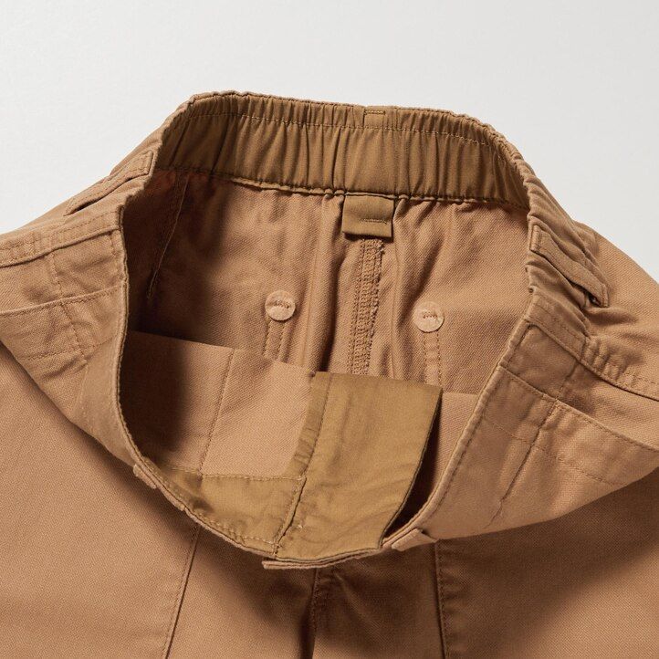 weiße uniqlo damen-bäckerblusen mit weitem bein